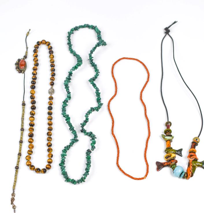 Tigers Eye, Malachite & More Necklaces Lot of 4: Includes (4) round bead tigers eye necklace with sterling clasp. Beaded striped orange with black necklace, Metal bead and silver pendant with red stone necklace that needs repair. Malachite chip neck