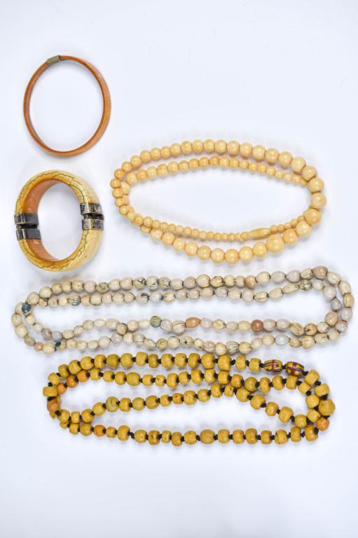 Antique Sterling Bone Bracelets & Beaded Necklaces: Includes (5) 2 Sterling Silver Bone Bracelets, both bracelet measures 2 3/4" side to side diameter. Bone beaded necklace. African trade beaded necklace. Seed beaded necklace. Longest necklace is 43" i