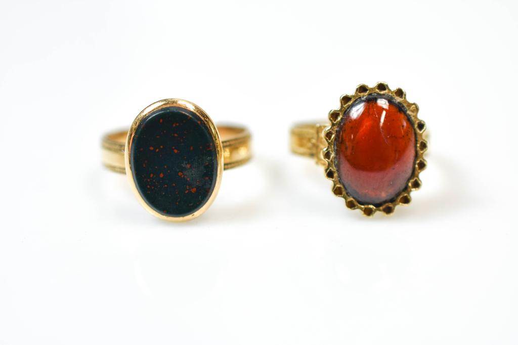 Two Gold Rings: 14K yellow gold ring with oval carnelian cabochon and other with an oval bloodstone tablet, ring sizes 6-3/4 and 7-1/2, 4.8 dwt.