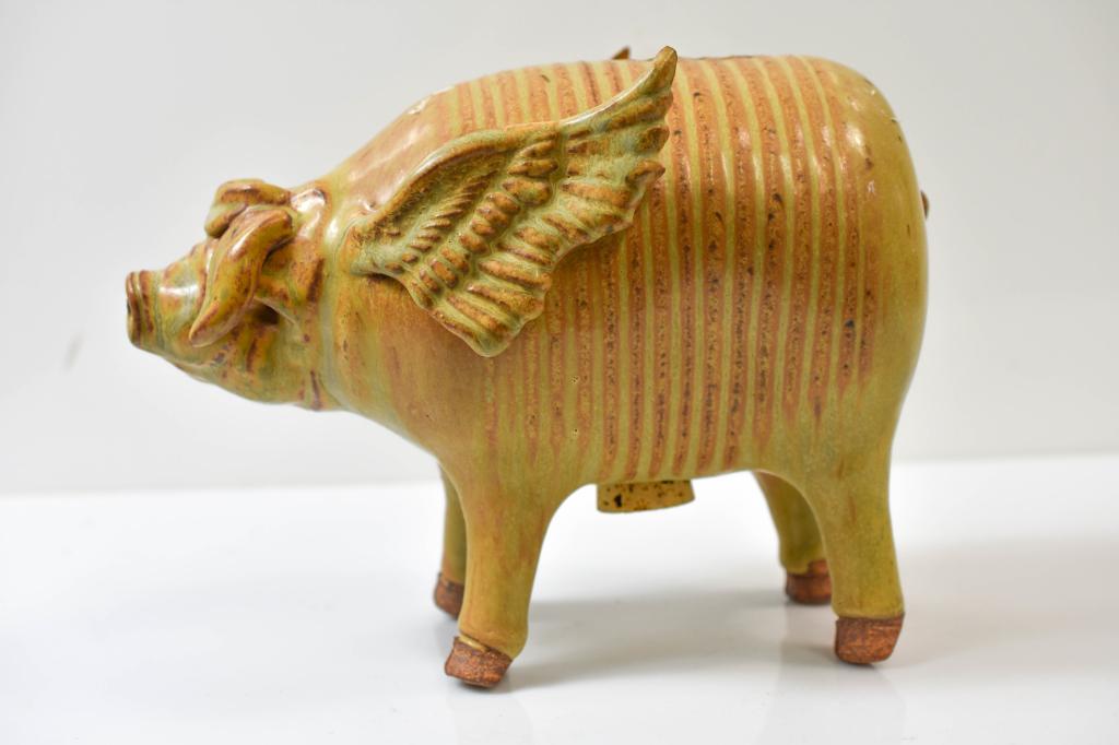 Earthenware Piggy Bank With Cork: Includes: Earthenware Piggy Bank Measures Approximately: 10" L X 7" H X 5" W