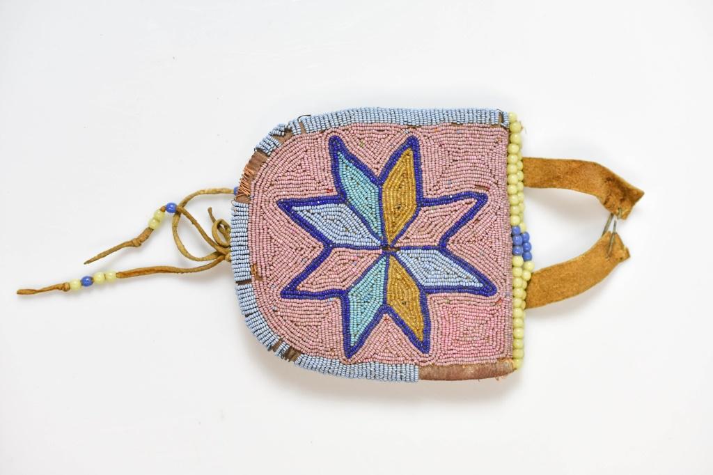Sioux Beaded Leather Strike-A-Light: A Fine Example Of A Sioux Beaded Strike-A-Light Bag, Tobacco Bag, Or Pouch. Finely Beaded With The Smallest And Most Intricate Beading. In A Stylized Sunburst, Star, Medallion Pattern, Could Also Be C
