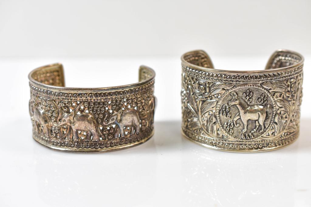 Sterling Cuff Bracelets: Includes (2) Silver Cufflink Bracelets, Marked 925 On Rim. Bracelets Depict Wildlife And Floral Designs. Bracelets Weighs Approx. 1.7 Ozt; And Approx. 1.6 Ozt.
