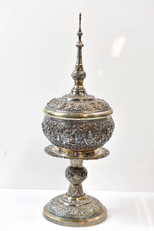 Burmese Chased Large Silver Cup and Cover: Includes A Burmese Chased Large Silver Cup and Cover. Piece Is Intrinsically Detailed In High Relief Depicting Traditional Scenes And Showing Very Detailed Figures Against A Chiseled Matted Background
