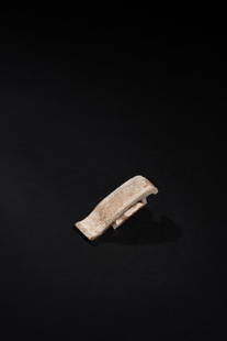 A JADE SCABBARD SLIDE, HAN DYNASTY: 漢 雲紋玉劍璏A JADE SCABBARD SLIDE, HAN