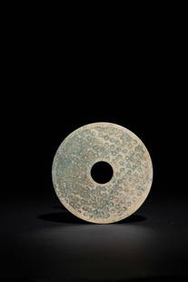 A CELADON JADE DISC, HAN DYNASTY: 漢 青白玉榖紋璧A CELADON JADE DISC, HAN DYNASTYD. 15.2