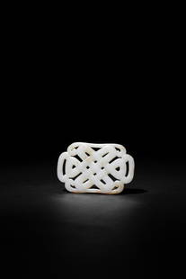 A FINE AND RARE WHITE JADE BELT PLAQUE, MING DYNASTY: 明 白玉盤腸珮A FINE AND RARE WHITE JADE BELT PLAQUE, MING