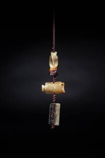 THREE JADE PENDANTS, MING DYNASTY: THREE JADE PENDANTS, MING DYNASTY明 翁仲、剛卯、司南珮,尺寸翁 H. 3.1 cm, 南 W. 3 cm, 剛 H. 2.8 cm
