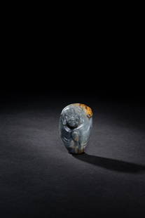 A GRAY AND BLACK JADE LUOHAN: A GRAY AND BLACK JADE 'LUOHAN'灰玉雕羅漢