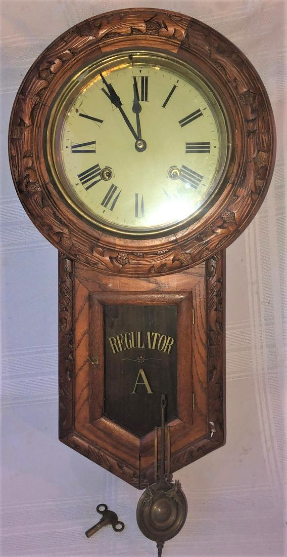 CARVED OAK REGULATOR WALL CLOCK: OAK REGULATOR WALL CLOCK W/ CARVED CASE