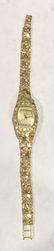 VINTAGE 14K GOLD LADIES NUGGET WATCH
