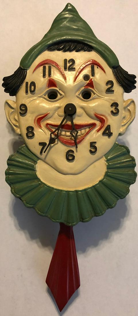 LUX ANIMATED CLOWN W/ RED TIE PENDULETTE CLOCK: LUX PENDULETTE ANIMATED CLOWN CLOCK W/ GREEN HAT & COLLAR AND RED TIE - EYES & TIE MOVE - LUX CLOCK MFG. CO. WATERBURY CONN. U.S.A. - NO. 324 CIRCA 1935 - 4" X 9 1/4" - ORIGINAL BOX