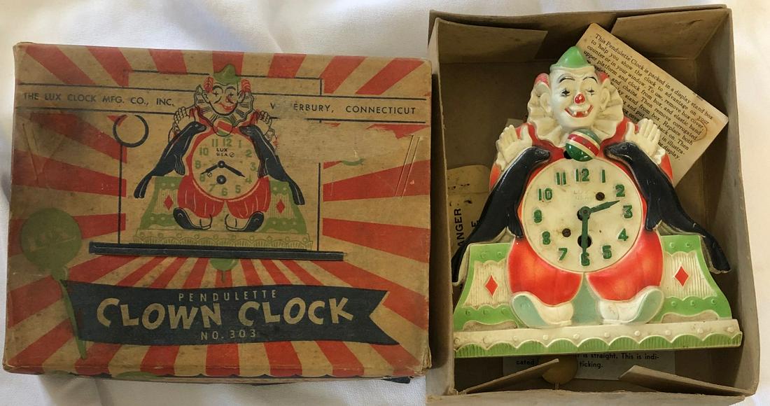LUX ANIMATED CLOWN & SEALS PENDULETTE WALL CLOCK: LUX ANIMATED CLOWN WITH SEALS TOSSING BALL PENDULETTE WALL CLOCK - LUX CLOCK MFG. CO. WATERBURY CONN. U.S.A. - NO. 303 CIRCA 1937 - 7" X 5 3/4"