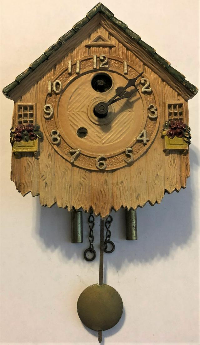 KEEBLER SMALL TAN COUNTRY HOUSE PENDULETTE CLOCK: KEEBLER SMALL TAN COUNTRY HOUSE PENDULETTE WALL CLOCK W/ FLOWER BOXES - AUGUST C. KEEBLER CO. CHICAGO ILL. - NO. 213 CIRCA 1931 - 3 1/2" X 6 1/4"