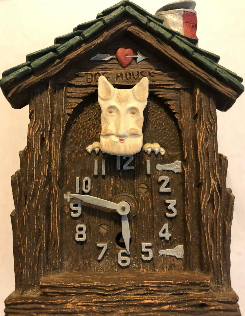 ANIMATED 'DOG HOUSE' PENDULETTE CLOCK: ANIMATED 'DOG HOUSE' PENDULETTE WALL CLOCK -WHITE SCOTTY DOG HEAD GOES BACK AND FORTH - NO. 333 CIRCA 1937 - 4 3/8" X 7"
