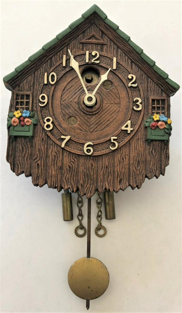 LUX SMALL DARK BROWN COUNTRY HOUSE PENDULETTE CLOCK: LUX SMALL DARK BROWN COUNTRY HOUSE PENDULETTE WALL CLOCK W/ FLOWER BOXES - LUX CLOCK MFG. CO. WATERBURY CONN. U.S.A. - NO. 213 CIRCA 1931 - 3 1/2" X 6 1/4"