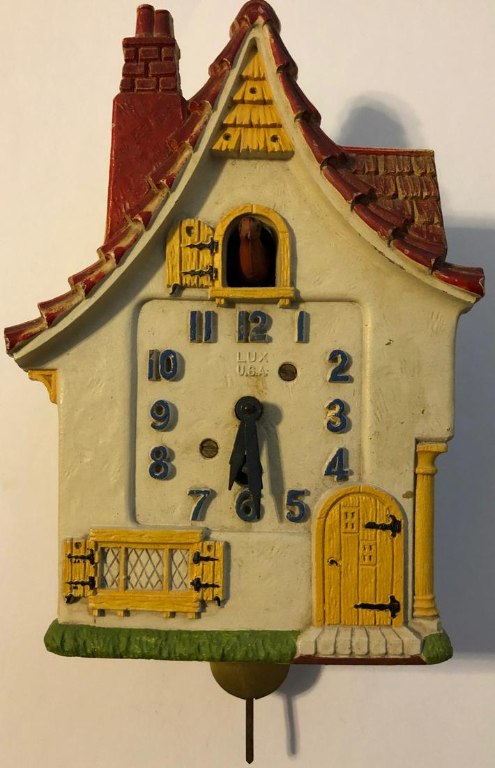 LUX ANIMATED DUTCH COTTAGE PENDULETTE CLOCK: LUX ANIMATED DUTCH COTTAGE STYLE PENDULETTE WALL CLOCK W/ RED ROOF - LUX CLOCK MFG. CO. WATERBURY CONN. U.S.A. - NO. 380 CIRCA 1938 - 4 1/4" X 7 1/2"