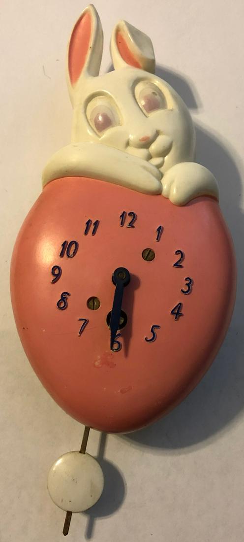 LUX PINK HONEY BUNNY RABBIT PENDULETTE CLOCK: LUX PINK HONEY BUNNY RABBIT & HEART PENDULETTE WALL CLOCK - LUX CLOCK MFG. CO. WATERBURY CONN. U.S.A. - NO. 321 CIRCA LATE 1940'S - 3 1/2" X 6 1/2"