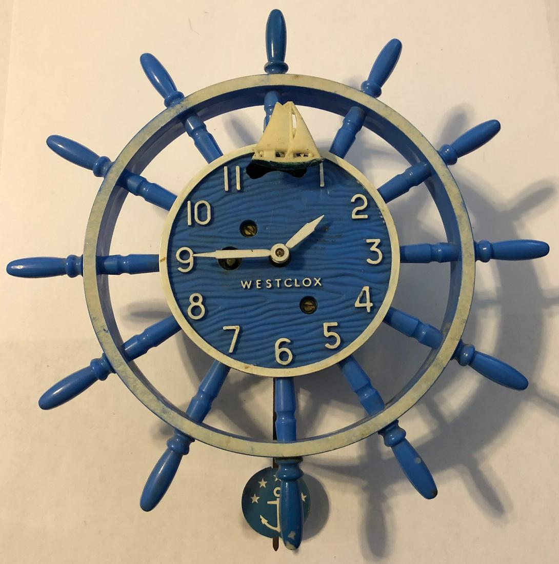 WESTCLOX ANIMATED BLUE SAILOR PENDULETTE CLOCK: WESTCLOX ANIMATED SAILOR'S BLUE SHIP'S WHEEL PENDULETTE WALL CLOCK W/ ROCKING BOAT - NO. 526 CIRCA 1958 - 6 1/2" DIAMETER