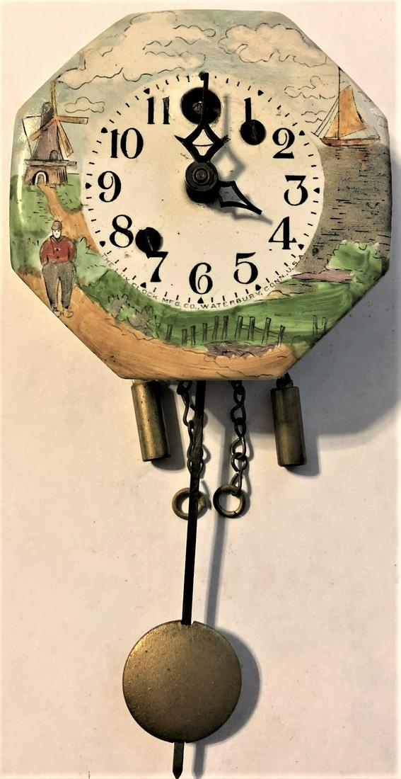 PORCELAIN / ENAMEL DUTCH MILL LANDSCAPE PENDULETTE: WALL CLOCK - 'DUTCH SCENE' W/ WINDMILL, BOAT, MAN WALKING - LUX CLOCK MFG. CO. WATERBURY, CONN. U.S.A. - 2 5/8" X 5 1/2"