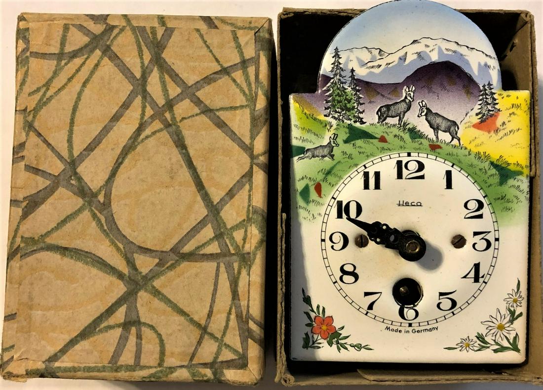 PORCELAIN / ENAMEL MOUNTAIN GOATS PENDULETTE CLOCK: WALL CLOCK IN ORIGINAL BOX W/ ORIGINAL KEY - LANDSCAPE SCENE WITH 3 MOUNTAIN GOATS - "HECO MADE IN GERMANY" -