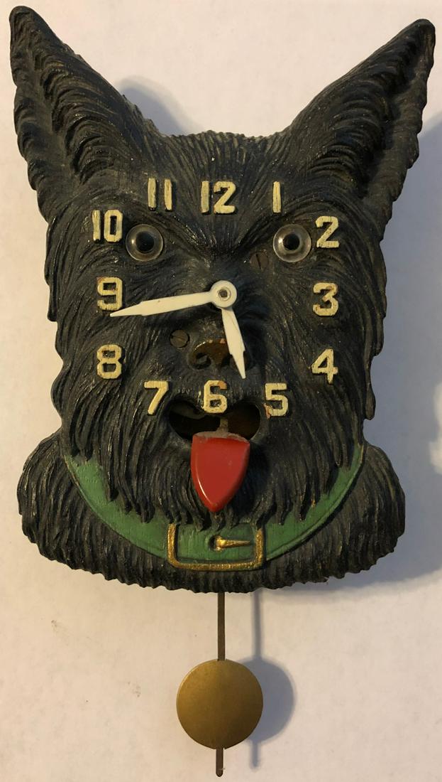 LUX / KEEBLER ANIMATED BLACK SCOTTY DOG PENDULETTE: KEEBLER ANIMATED BLACK SCOTTY DOG PENDULETTE WALL CLOCK - WAGGING TONGUE - KEEBLER CLOCK CO. PHILADELPHIA, PA. - NO. 317 CIRCA 1937 - 3 3/4" X 7 1/2"