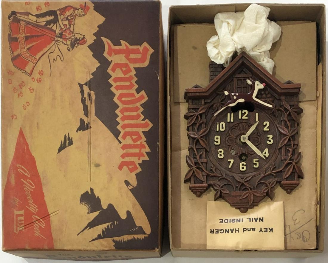 LUX ANIMATED RUDOLPH PENDULETTE WALL CLOCK: RUDOLPH THE RED NOSED REINDEER - NO. 302 - LUX CLOCK MFG. CO. WATERBURY CONN. U.S.A. - CIRCA 1949 - 1956 - 7" HIGH X 4" WIDE - IN THE ORIGINAL BOX W/ ORIG. KEY - APPEARS TO BE UNUSED
