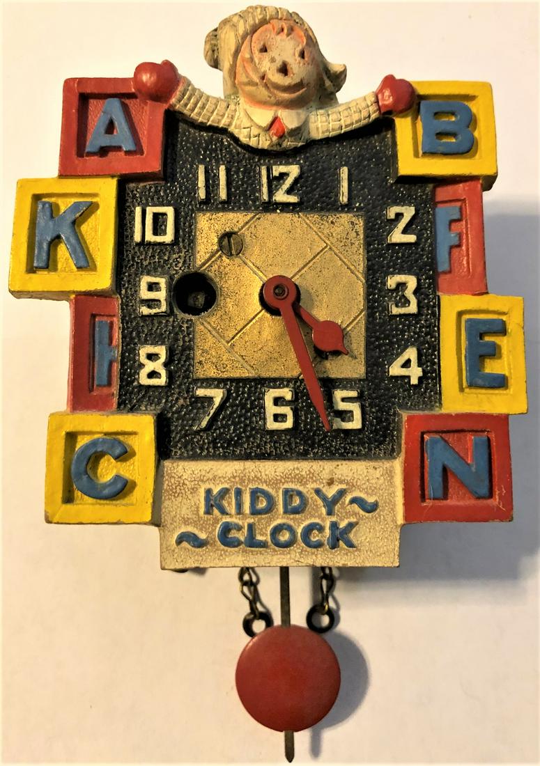 KEEBLER ABC KIDDY PENDULETTE WALL CLOCK: KEEBLER "ABC KIDDIE CLOCK" PENDULETTE WALL CLOCK - AUGUST C. KEEBLER CO. CHICAGO ILL. - NO. 380 CIRCA 1934 - 3 1/2" X 5 1/2"