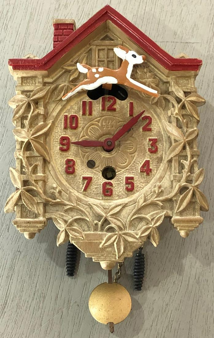 LUX ANIMATED RUDOLPH PENDULETTE WALL CLOCK: RUDOLPH THE RED NOSED REINDEER - NO. 302A - LUX CLOCK MFG. CO. WATERBURY CONN. U.S.A. - CIRCA 1949 - 1956 - 7" HIGH X 4" WIDE