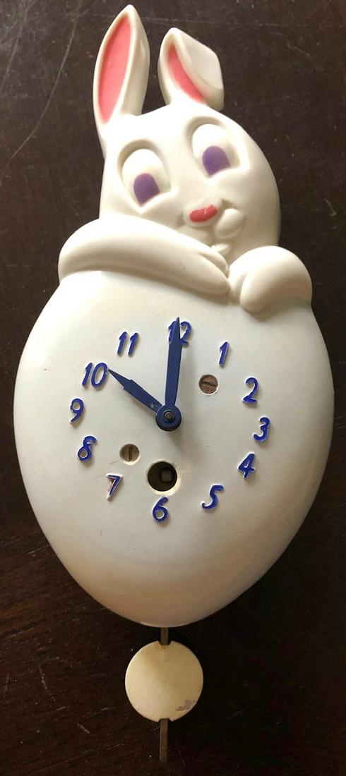 LUX WHITE HONEY BUNNY RABBIT PENDULETTE CLOCK: LUX WHITE HONEY BUNNY RABBIT & HEART PENDULETTE WALL CLOCK - LUX CLOCK MFG. CO. WATERBURY CONN. U.S.A. - NO. 321 CIRCA LATE 1940'S - 3 1/2" X 6 1/2"
