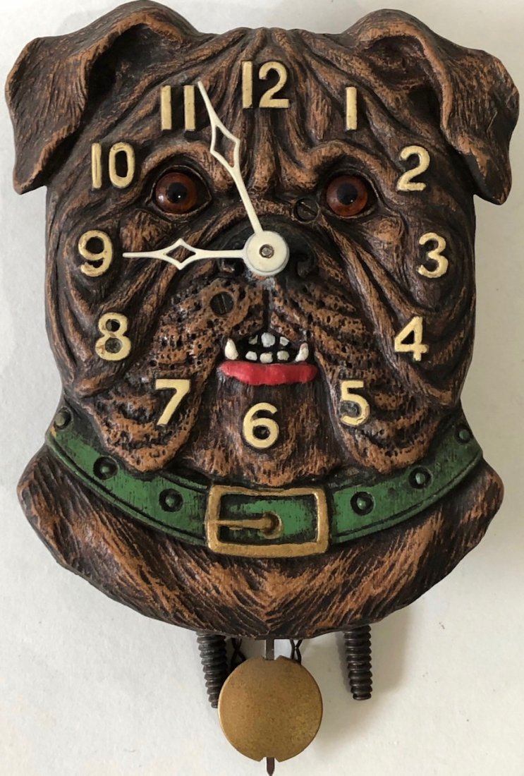 LUX BROWN BULL DOG FACE PENDULETTE WALL CLOCK: LUX BROWN BULL DOG FACE PENDULETTE WALL CLOCK - NO. 323 - CIRCA 1937 - 8" HIGH X 4" WIDE