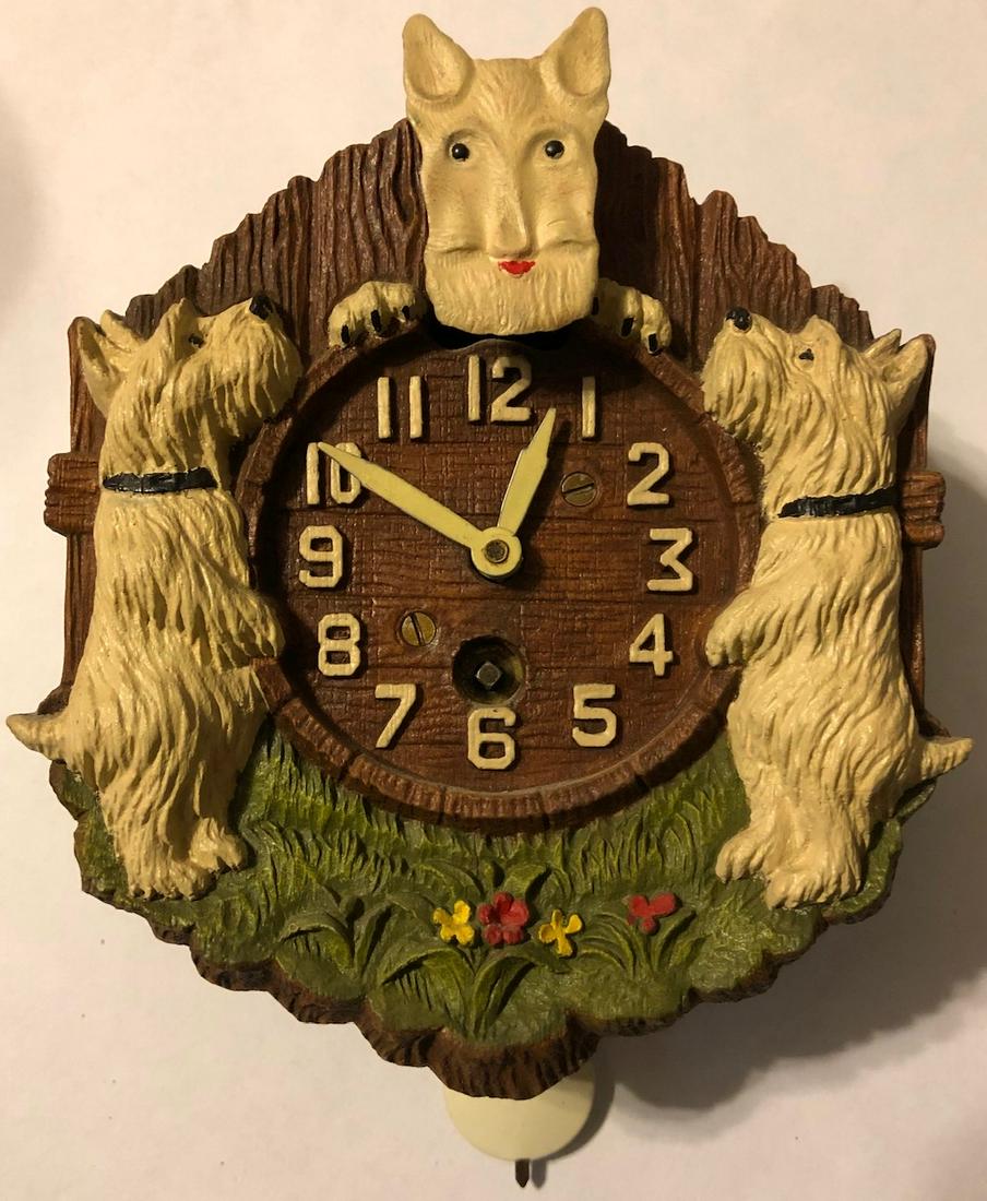ANIMATED WHITE PLAYFUL SCOTTY PENDULETTE CLOCK: ANIMATED WHITE KNODDING SCOTTY PENDULETTE WALL CLOCK WITH 2 WHITE STANDING SCOTTY DOGS - LUX CLOCK MFG. CO. WATERBURY CONN. U.S.A - NO. 355 CIRCA 1937 - 4 1/4" X 5 3/4"