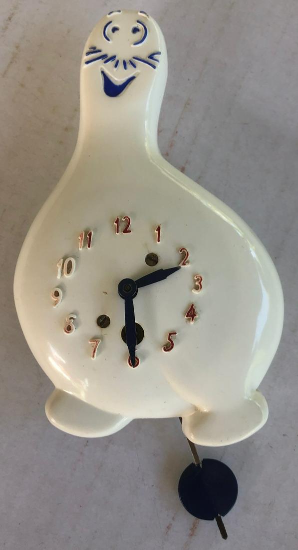 LUX WHITE SHMOO (AL CAPP'S LI'L ABNER) PENDULETTE CLOCK: LUX WHITE SCHMOO (CREATED BY AL CAPP IN LI'L ABNER) PENDULETTE WALL CLOCK - LUX CLOCK MFG. CO. WATERBURY CONN. U.S.A. - NO. 320 CIRCA 1949 - 5" X 7"