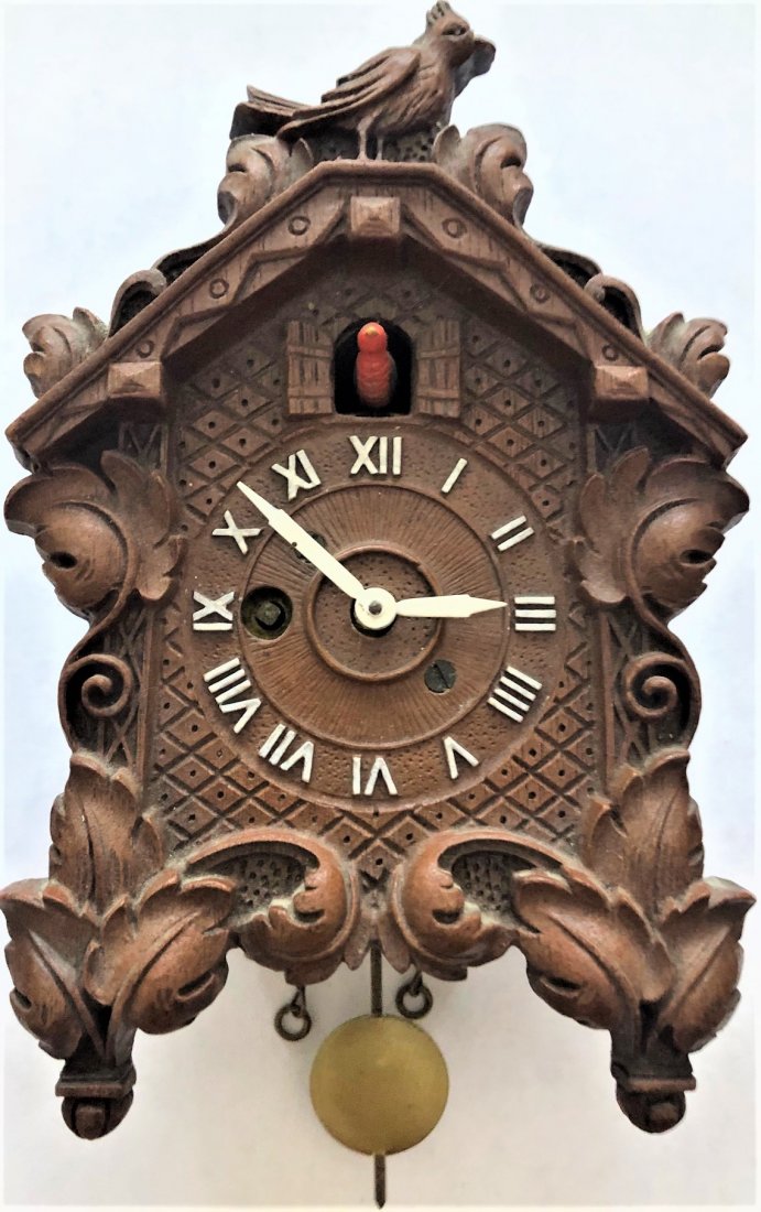 BROWN ANIMATED BOBBING BIRD PENDULETTE CUCKOO CLOCK: KEEBLER BROWN ANIMATED BOBBING RED BIRD PENDULETTE CUCKOO STYLE WALL CLOCK - TOP BIRD LOOKING RIGHT - AUGUST C. KEEBLER CO. CHICAGO ILL. NO. 240 CIRCA 1936 - 1942 - 4" X 6 3/4"