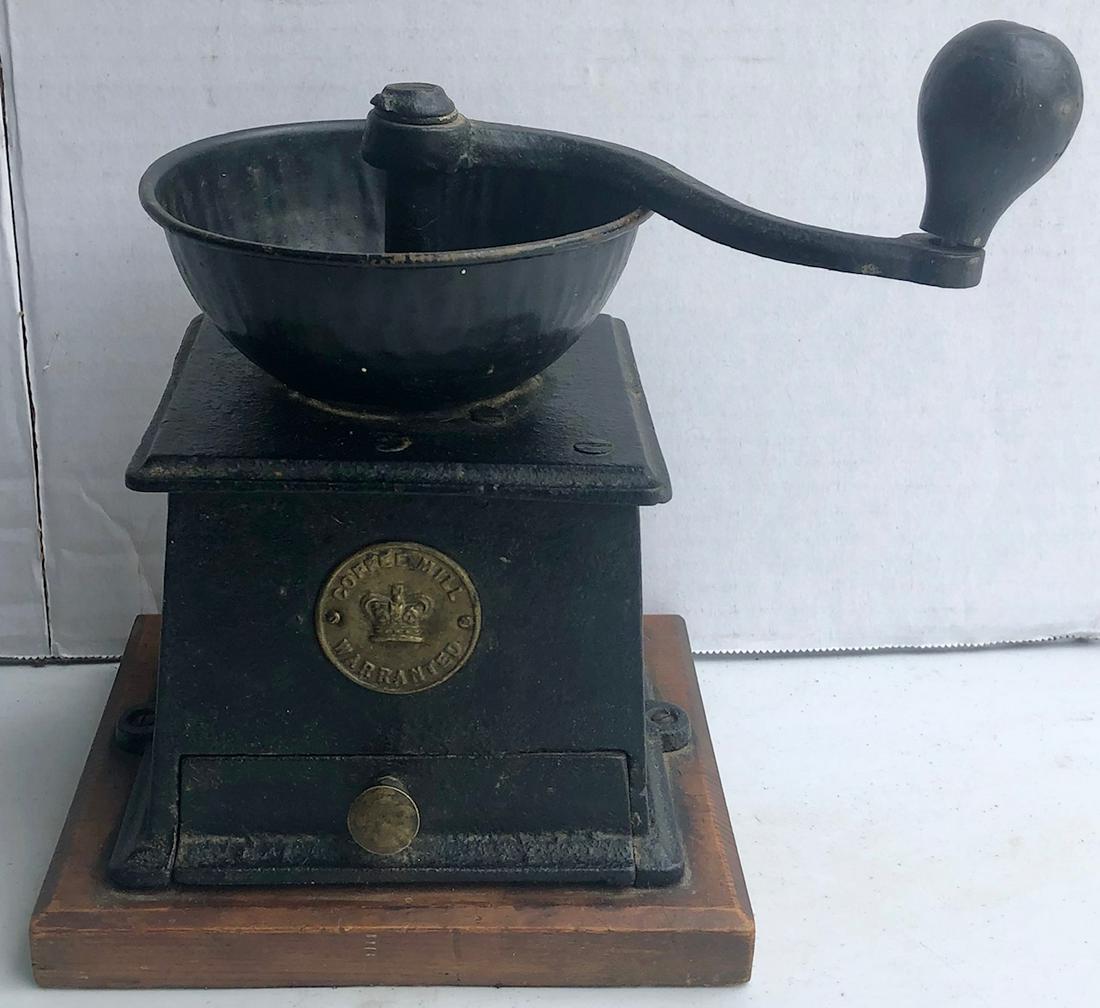 CAST IRON & BRASS COFFEE GRINDER / MILL: BRASS MEDALLION "COFFEE MILL WARRANTED" WITH EMBOSSED CROWN - CAST IRON DRAWER WITH BRASS KNOB