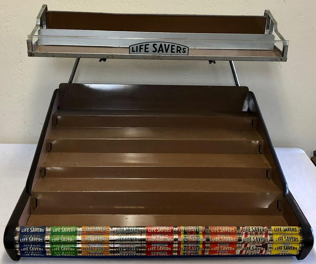 VINTAGE METAL COUNTRY STORE LIFE SAVERS DISPLAY: VINTAGE ART DECO ERA MULTI-TIER METAL COUNTRY STORE LIFE SAVERS DISPLAY RACK WITH ORIGINAL GLASS "LIFE SAVERS" PANEL - BAKELITE SIDES