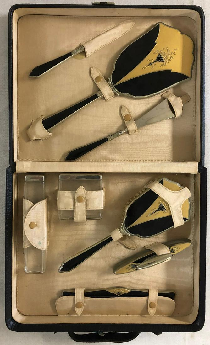 ART DECO TRAVELING DRESSER SET IN CASE: ART DECO TRAVELING DRESSER SET IN CASE - 8 ORIGINAL PIECESâ€¦HAND MIRROR, BRUSH, COMB, SHOE HORN, 2 JARS, FILE, ETC.