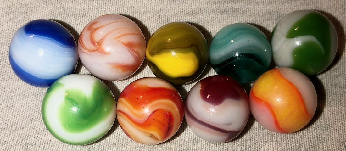 LOT 9 VINTAGE / ANTIQUE GLASS MARBLES: VARIOUS COLORS AND TYPES...AKRO AGATE, SLAG, ALLEY AGATE, CHRISTENSEN, PELTIER, ETC. - 2 GLOW 'PEACH' / ORANGE UNDER BLACK LIGHT - 1/2" - 9/16"