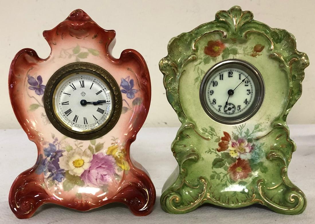 LOT 2 MINIATURE GERMAN ROYAL BONN PORCELAIN SHELF: ONE "AGATE" PATTERN ROYAL BONN CLOCK MARKED ON BACK WITH ROYAL BONN LOGO - THE OTHER IS MARKED "MADE IN GERMANY" - ONE GREEN WITH GILT HIGHLIGHTS AND FLORAL DECORATION AND PORCELAIN DIAL - AND ONE RUS