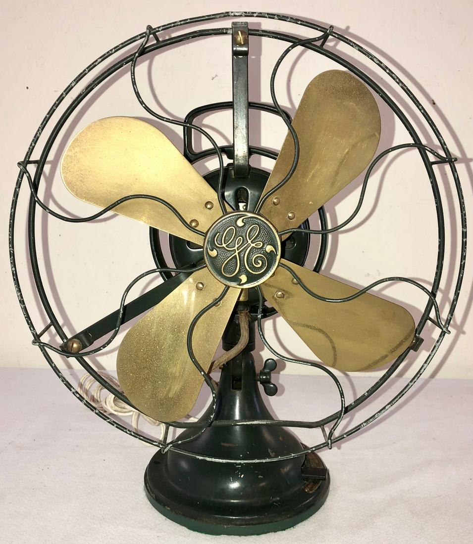 ANTIQUE GENERAL ELECTRIC BRASS BLADE FAN: TESTED AND WORKING - ANTIQUE G.E. / GENERAL ELECTRIC BRASS BLADE FAN WITH METAL CAGE - "TYPE AOU FORM AB1 - NO. D33407 / SPEC. 272058-1 / VOLTS 110 / CYCLES 60 / CAT. 75423 / GEN. ELEC. CO., U.S.A."