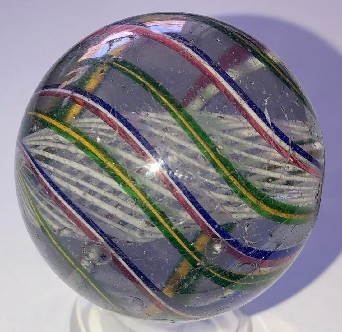 LG 1 3/4" ANTIQUE GERMAN SWIRL LATTICINIO CORE MARBLE: WITH RED, WHITE, BLUE AND GREEN & YELLOW OUTER SWIRLS WITH WHITE LATTICINO CORE - 1 3/4" DIAMETER - MINOR SURFACE WEAREâ€¦SEE PHOTOS