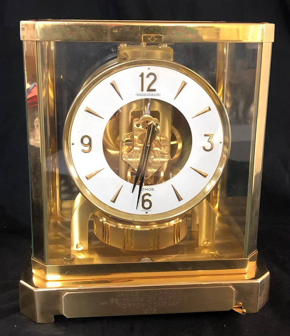 SWISS BRASS CASED LECOULTRE ATMOS SHELF CLOCK: SWISS BRASS AND GLASS CASED JAEGER LECOULTRE ATMOS SHELF CLOCK WITH BRASS WORKS - "SWITZERLAND" - 9 1/4" HIGH X 8 1/4" WIDE X 6 1/4" DEEP - EXCELLENT CONDITION OTHER THAN SURFACE WEAR - WORKING WHEN T