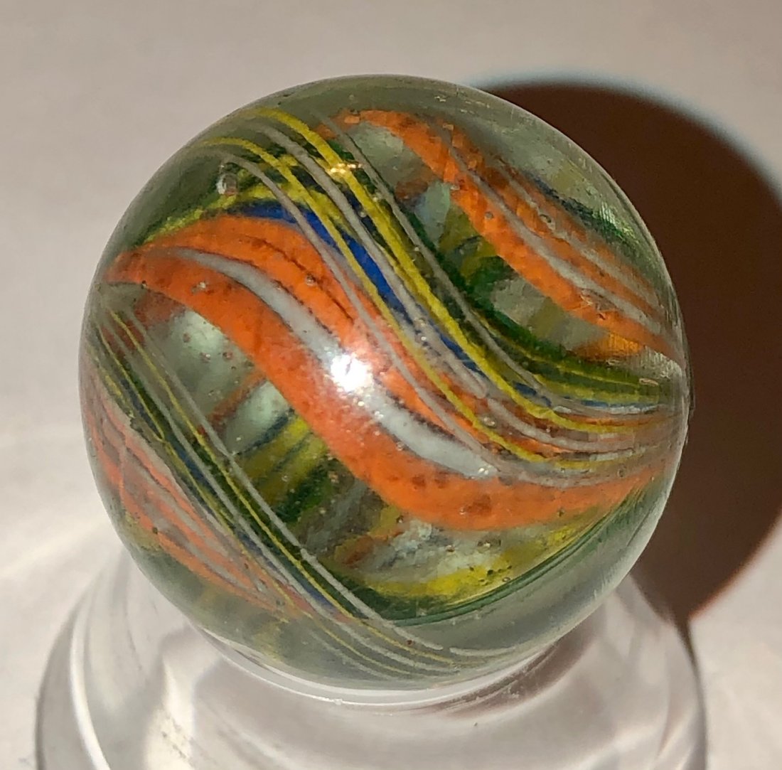 13/16" ANTIQUE GERMAN RIBBON CORE SWIRL MARBLE: 13/16" ANTIQUE GERMAN RIBBON CORE SWIRL MARBLE - TRIPLE RIBBON CORE IN ORANGE, BLUE, WHITE & YELLOW, WITH OUTER YELLOW & WHITE LATTICINIO TYPE BANDS - SURFACE WEAR CONSISTENT WITH AGE & USEâ€¦SEE 
