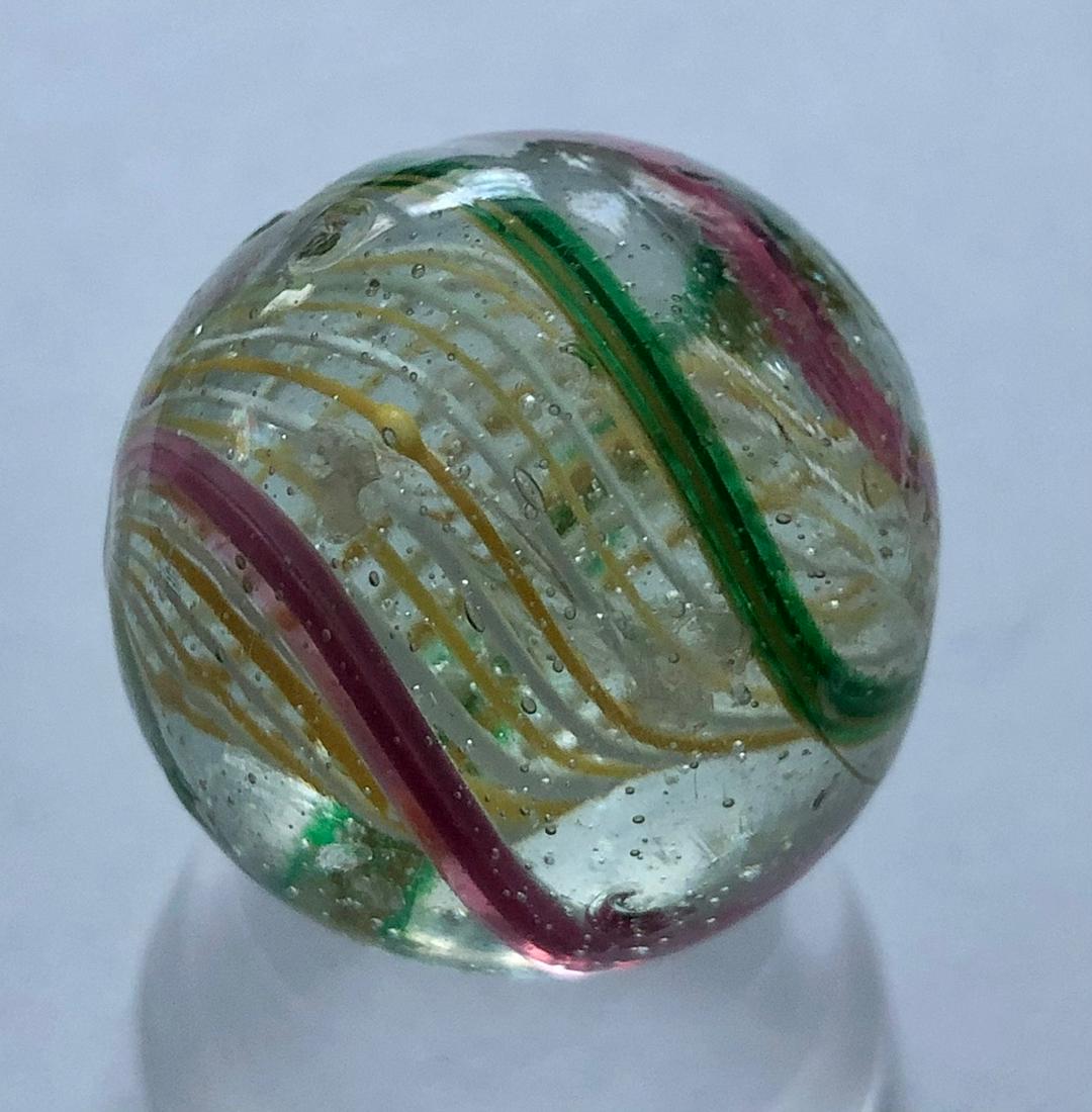 1 1/8" ANTIQUE GERMAN SWIRL LATTICINIO CORE MARBLE: 1 1/8" ANTIQUE GERMAN SWIRL LATTICINIO CORE MARBLE WITH UNUSUAL WHITE & YELLOW LATTICINIO CORE SURROUNDED BY PINK AND GREEN SWIRLS - UNPOLISHEDâ€¦SEVERAL SURFACE ABRASIONSâ€¦SEE PHOTOS