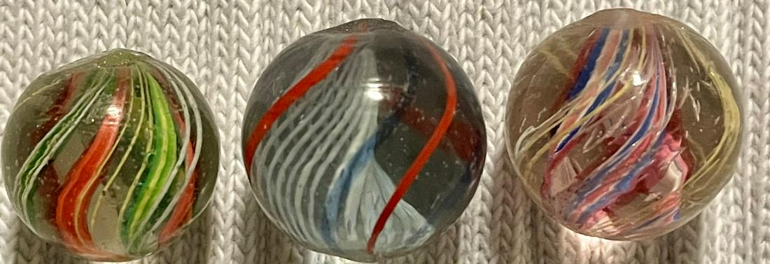 LOT 3 ANTIQUE GERMAN SWIRL MARBLES: ONE WHITE LATTICINIO CORE AND 2 RIBBON CORE WITH THIN LATTICINIO TYPE OUTER SWIRLS - 19/32" - 23/32"