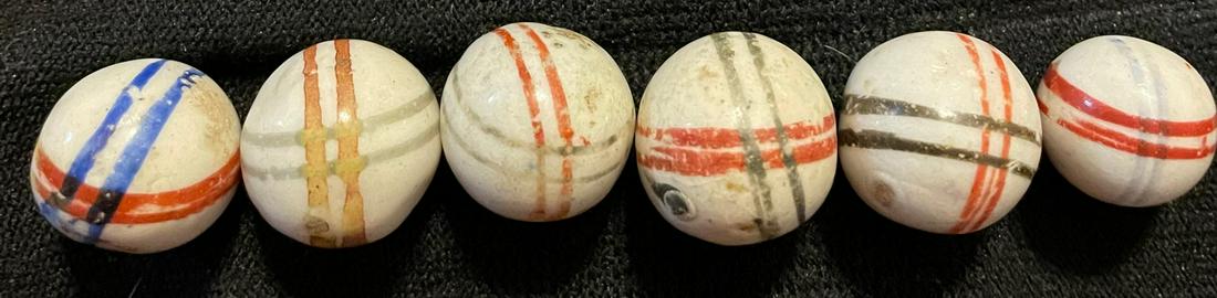 LOT 6 ANTIQUE GLAZED CHINA MARBLES: LOT 6 ANTIQUE GLAZED CHINA MARBLES WITH INTERSECTING LINES IN BLUE, RED & BLACK - 1/2" - 19/32"