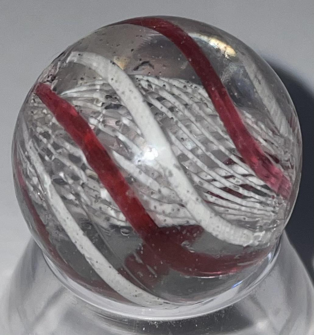 ANTIQUE GERMAN SWIRL LATTICINIO CORE MARBLE: ANTIQUE GERMAN SWIRL WHITE LATTICINIO CORE MARBLE WITH RED AND WHITE OUTER SWIRLS - VERY GOOD CONDITION WITH MINOR SURFACE WEAR - 13/16"