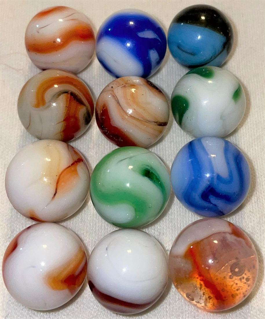 LOT 12 VINTAGE / ANTIQUE GLASS MARBLES: LOT 12 VINTAGE / ANTIQUE GLASS MARBLES - VARIOUS COLORS AND TYPES - AVENTURINE, AKRO AGATE, SLAG, ALLEY AGATE, CHRISTENSEN, PELTIER, ETC. - 1/2" - 9/16"