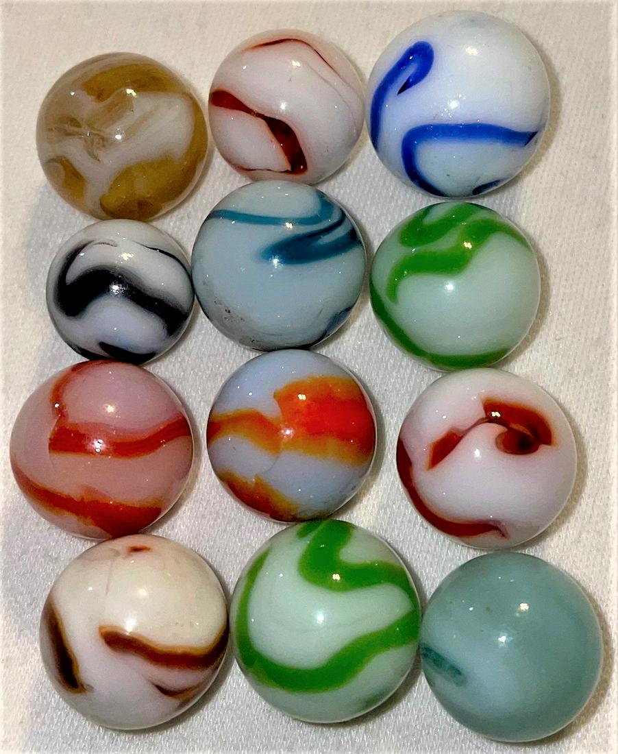 LOT 12 VINTAGE / ANTIQUE GLASS MARBLES: LOT 12 VINTAGE / ANTIQUE GLASS MARBLES - VARIOUS COLORS AND TYPES - AVENTURINE, AKRO AGATE, SLAG, ALLEY AGATE, CHRISTENSEN, PELTIER, ETC. - 15/32" - 5/8"