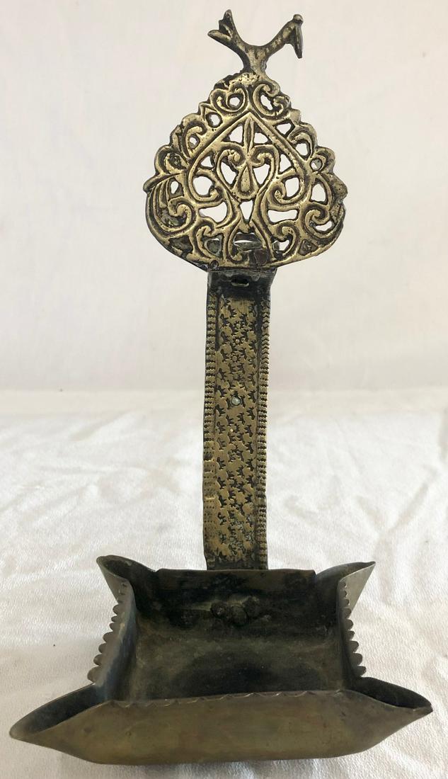 18TH C. BRASS MIDDLE EASTERN WHALE OIL / GREASE LAMP: 18TH C. BRASS MIDDLE EASTERN WHALE OIL / GREASE LAMP WITH CAST BRASS TOP WITH FIGURAL BIRD FINIAL AND DECORATIVE PUNCH WORK ON UPRIGHT - 4 WICK PAN WITH SCALLOPED EDGES