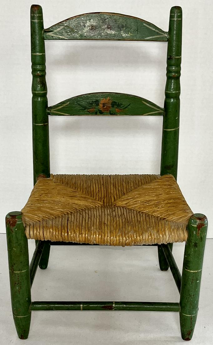 19TH C. PAINT DECORATED DOLL CHAIR: 19TH C. PAINT DECORATED DOLL CHAIR - ORIGINAL GREEN PAINT WITH HAND PAINTED FLORAL DECORATION ON BACK SLATS - GOOD OVERALL CONDITION AND STRUCTURALLY SOUND - MINOR LOSSES AND WEAR - 14 3/8" HIGH X 8 "